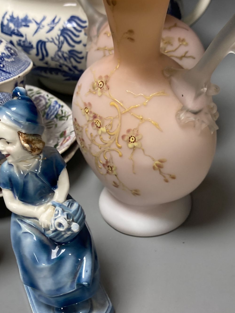 A 19th century pearlware Bacchus mask jug, a pair of Victorian pink opaline glass ewers and sundry items